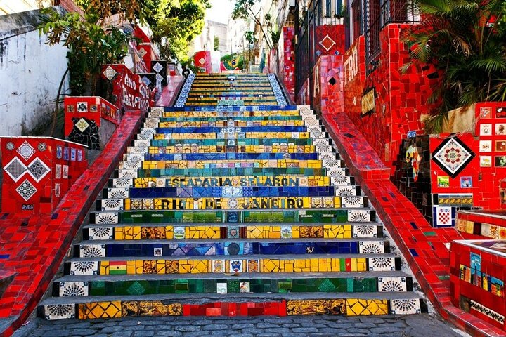 The vibrantly tiled Selarón Steps in Rio de Janeiro, Brazil, ascending between colorful walls.