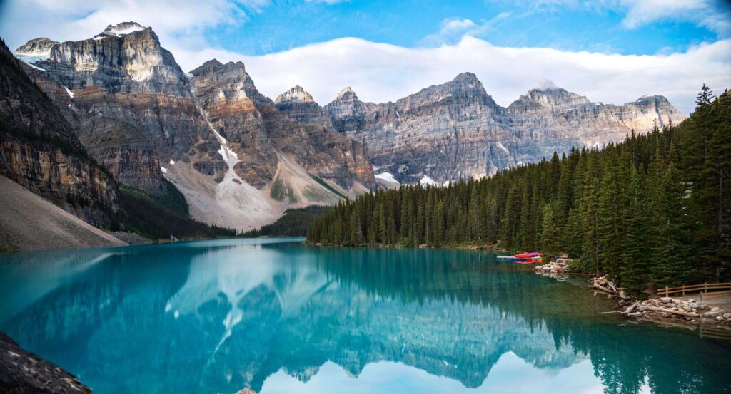 Cheapest destinations Moraine Lake in Banff National Park, Canada, in the Americas, with turquoise water reflecting the Valley of the Ten Peaks.