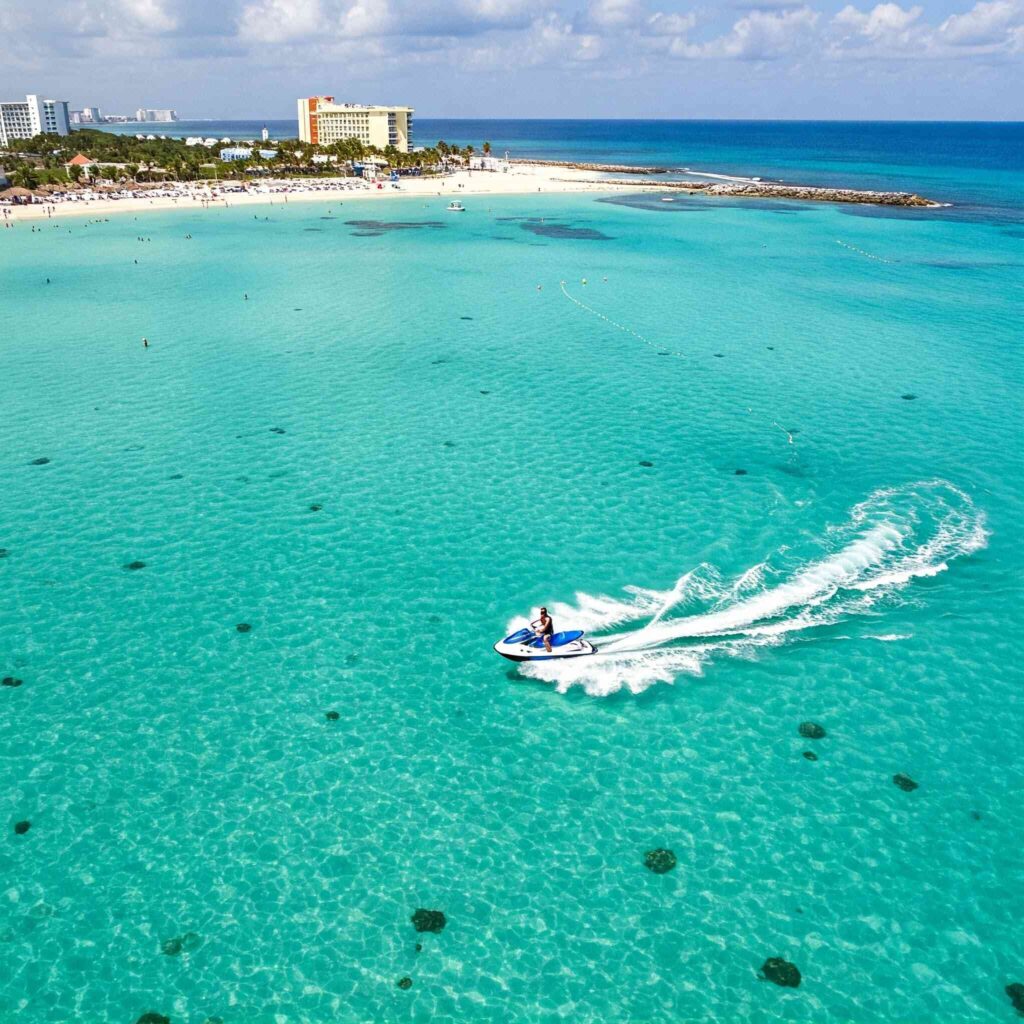 A person jet skiing in Cancun, Mexico.
